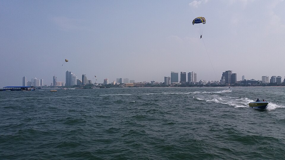 Pattaya skyline seen from the sea, showing the condominium towers along the beachfront that sit among the land and property holdings Thailand's nominee company crackdown is reviewing for foreigners moving to Thailand.