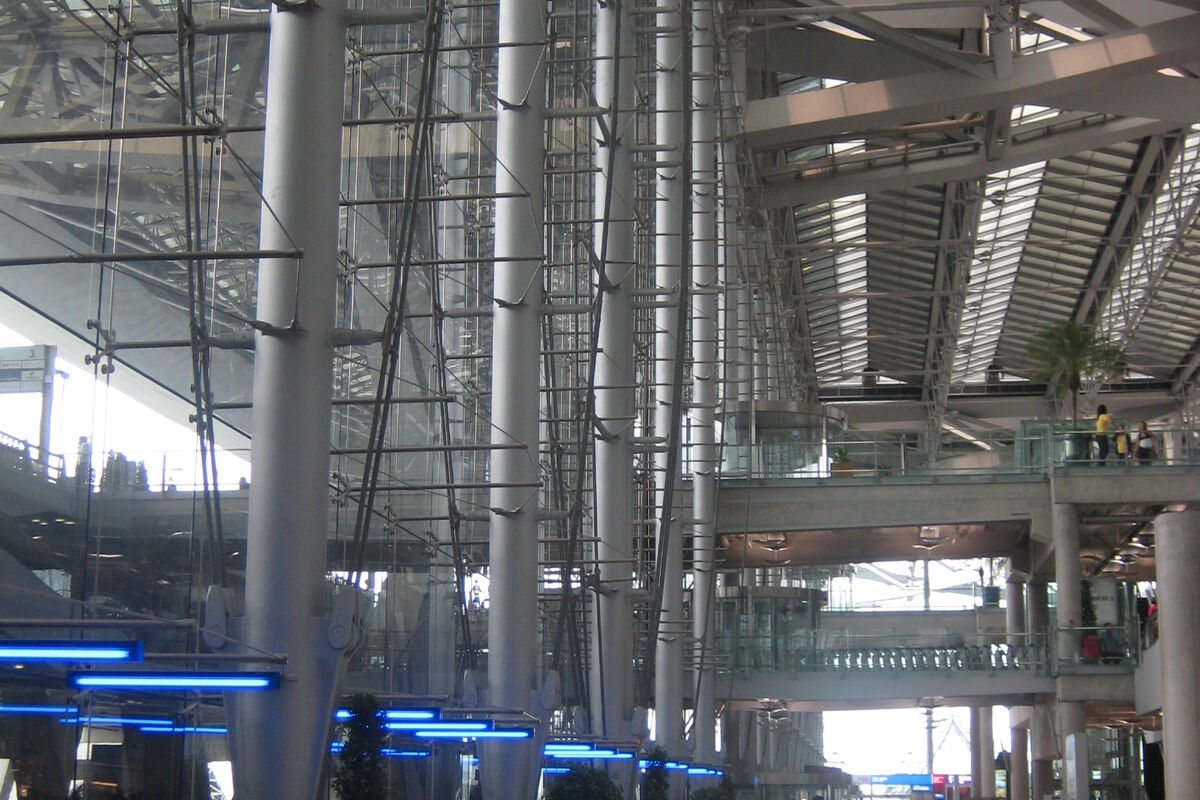 Arrival hall at Suvarnabhumi Airport in Bangkok, where Thailand Privilege (Thailand Elite) members use a dedicated fast-track immigration lane included in every membership tier of the Thailand long stay programme.