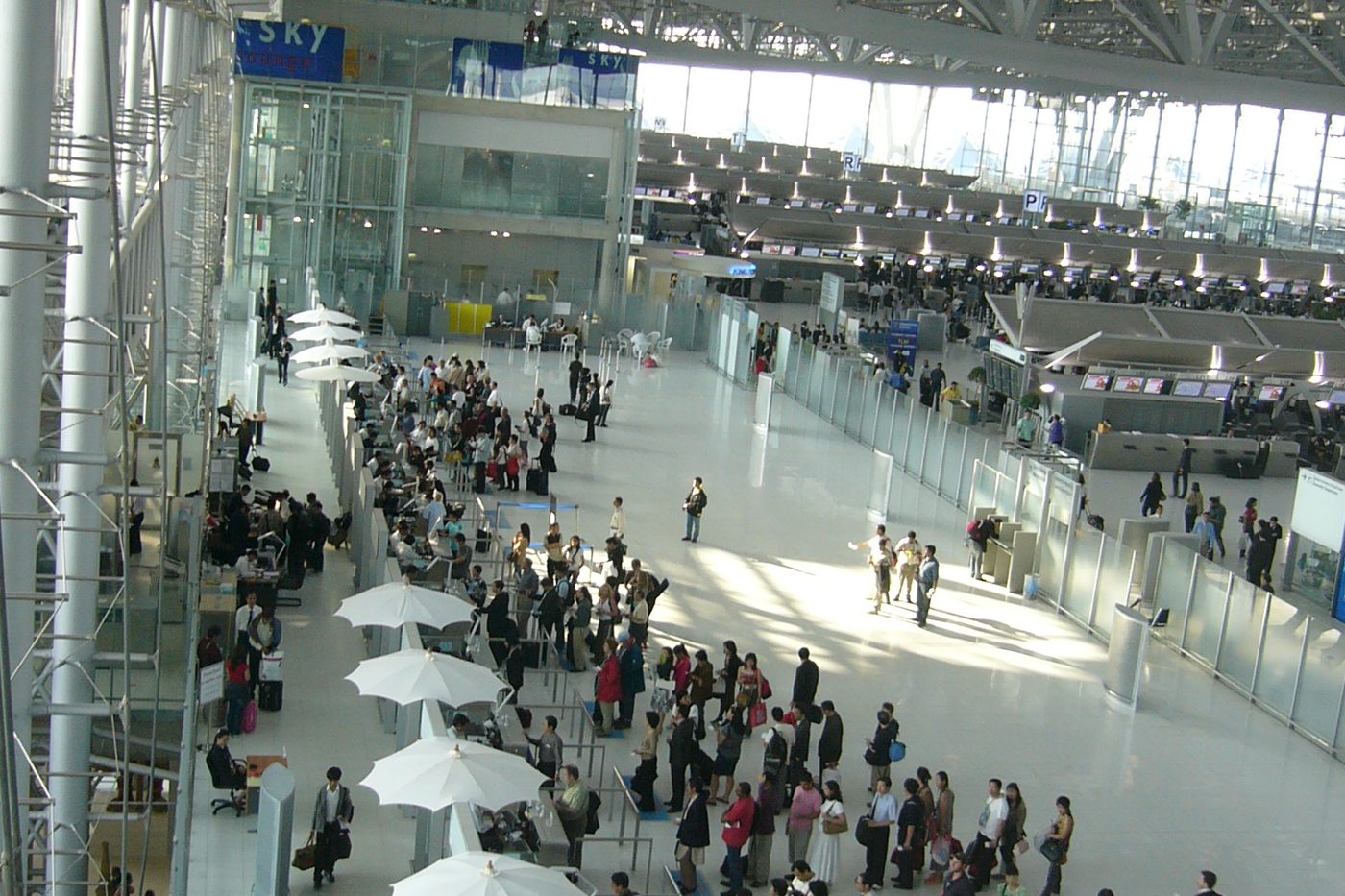 Overview of the arrivals and immigration hall at Suvarnabhumi International Airport in Bangkok, showing queues of foreign travellers who would be affected by Thailand's proposed entry fee.