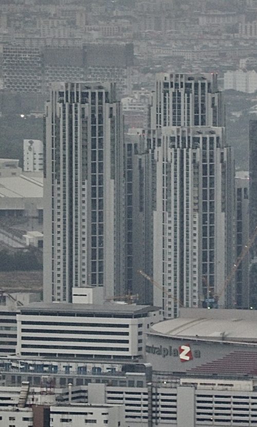 Belle Grand Rama 9 condominium towers in Bangkok, a typical Rama 9 expat condo block, relevant to renting in Thailand and Thai visa long-stay residents.