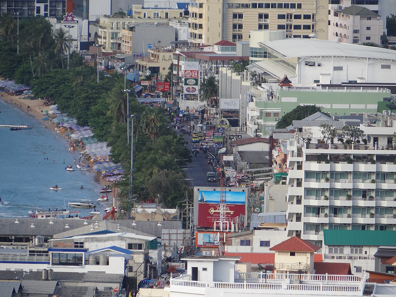 Pattaya Beach Road seen from a hill in Thailand, with hotels, shopfronts and the bay, home to thousands of expats living in Thailand who need an emergency plan