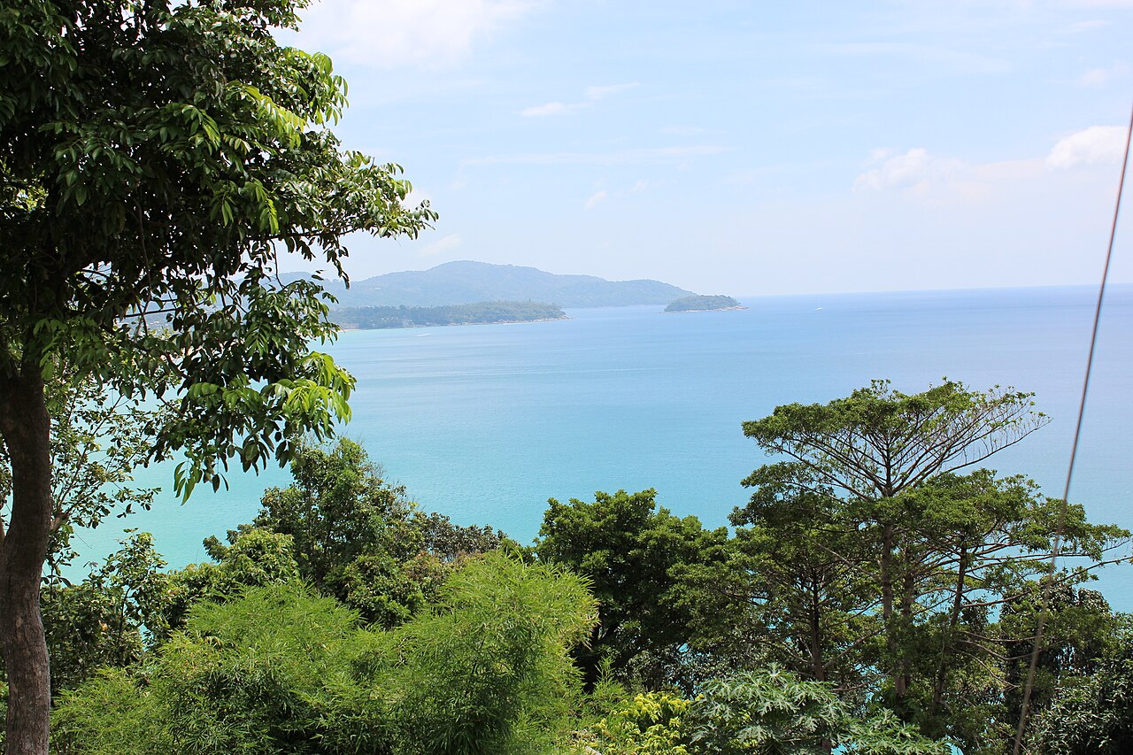View over the Andaman Sea and forested hillside near Kata in Phuket, Thailand, coastal land where nominee ownership checks matter for anyone moving to Thailand and buying or renting a villa
